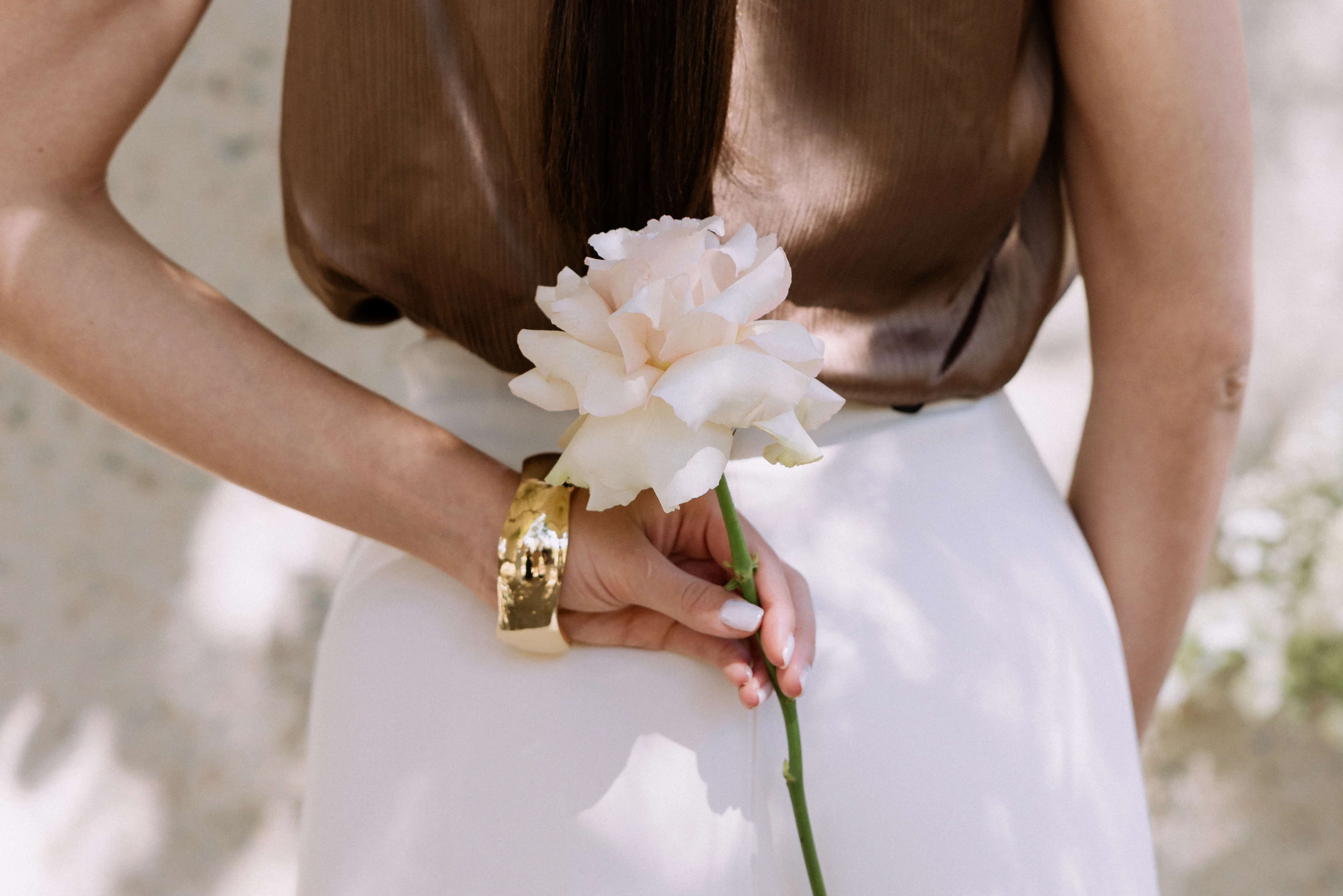 Wedding Content Creator - Eva Holding a Rose